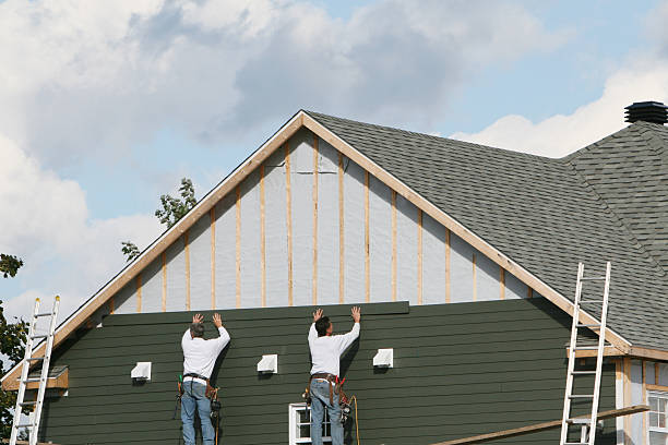 Professional Siding technician working in Clinton, SC
